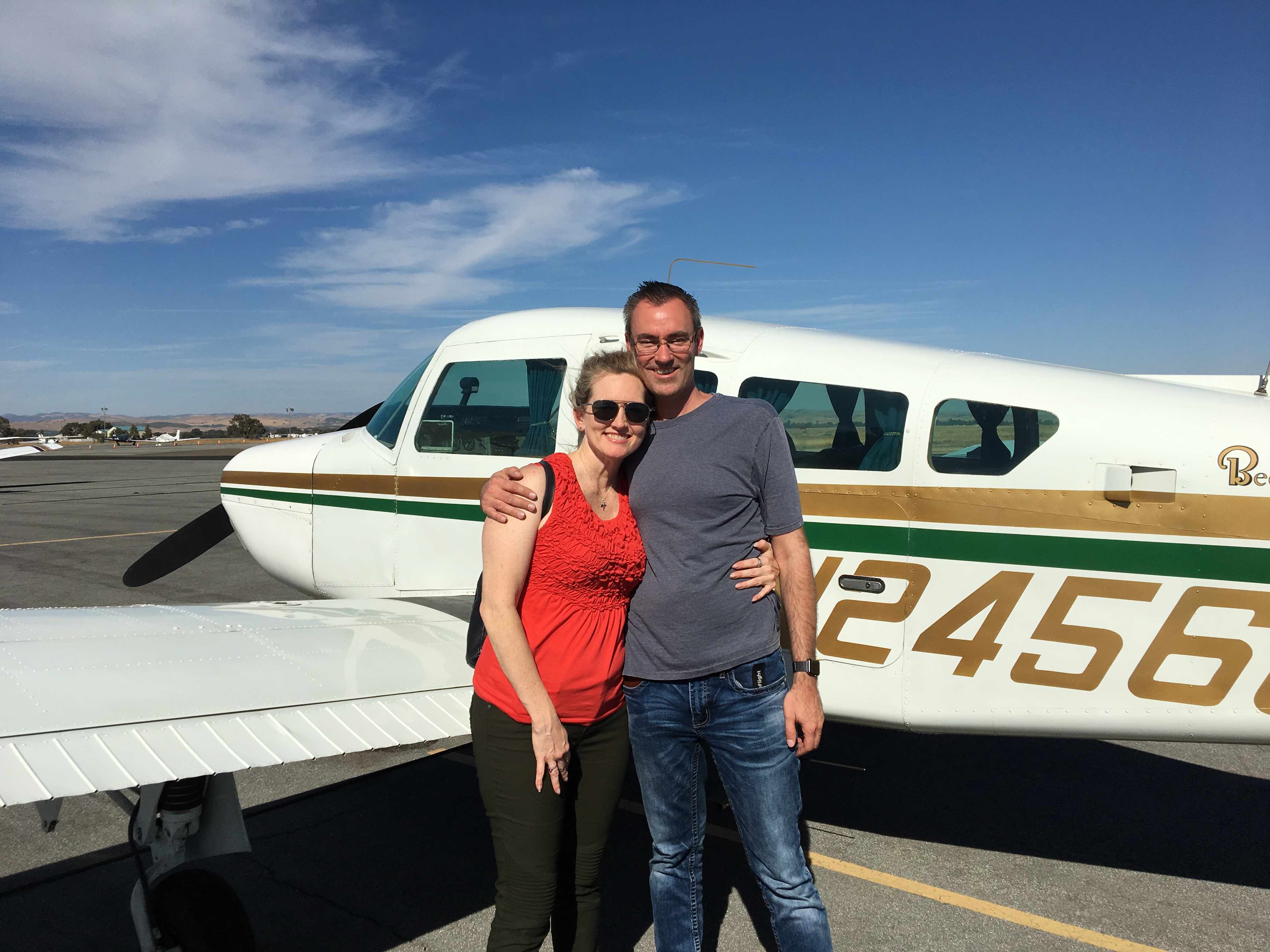 Jenny and Travis with their Beechcraft
