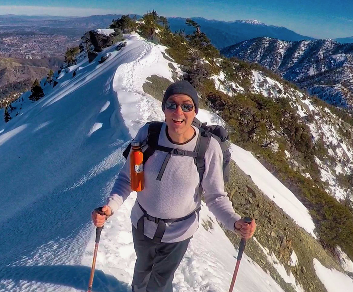 Travis on Devil's Backbone ridgeline in snow